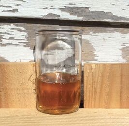 a cup of syrup from boiled sap