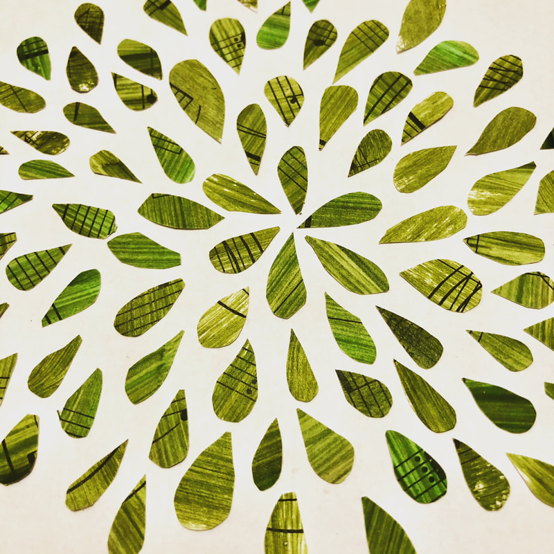 collage leaf pieces arranges in a sunburst pattern