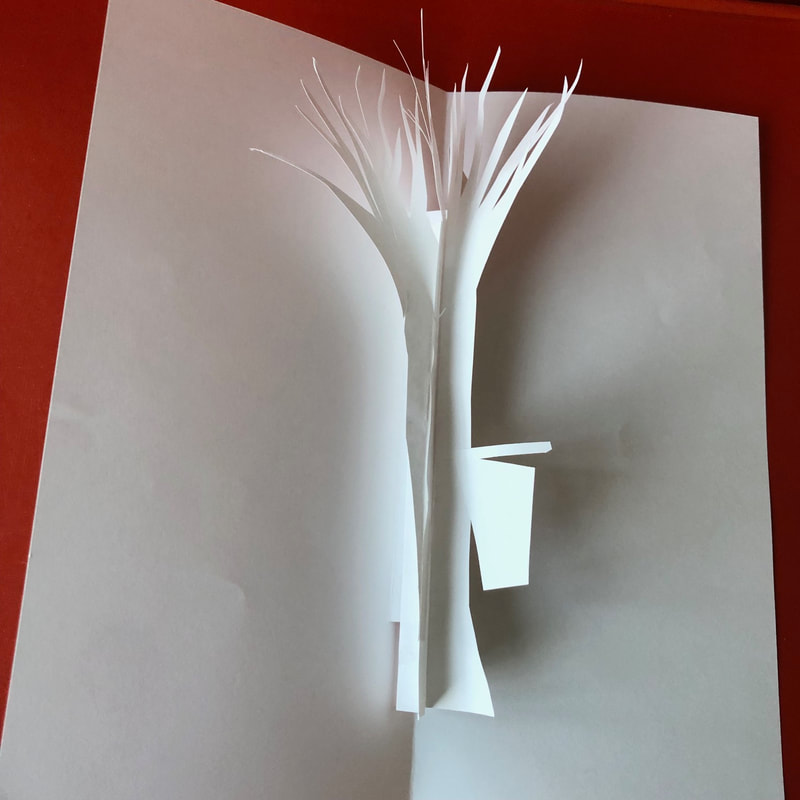 Experimental pop-up book structure of tree with sap bucket