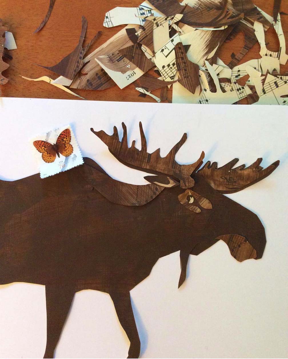 Moose collage with butterfly stamp